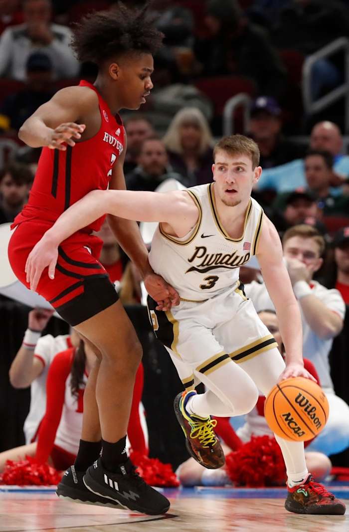 Jalen Miller (2) defends Purdue Boilermakers guard Braden Smith (3) during the Big Ten Men s Basketball Tournament game.